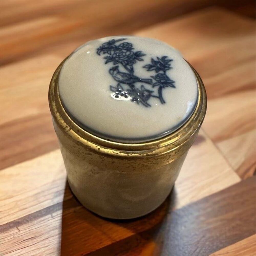 vintage brass container with blue and white ceramic lid chinoiserie